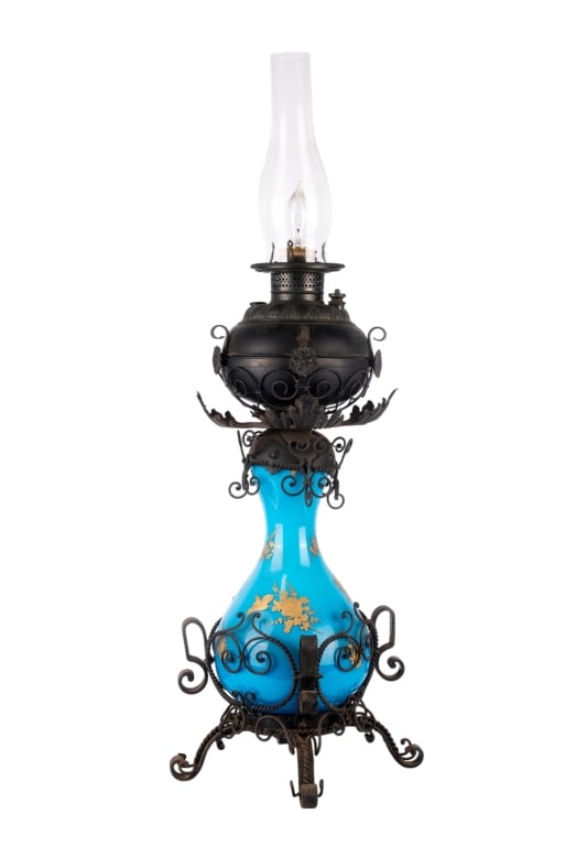 VINTAGE ELECTRIFIED OIL TABLE LAMP: Vintage electrified oil lamp mounted as table lamp. Approximate dimensions: h. 34", dia. 12" Disclaimer: Participating bidders must have a credit card on file with LiveAuctioneers in order for their