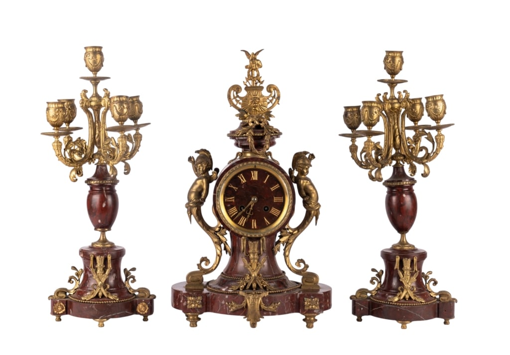 JAPY FRERES GILT BRONZE & MARBLE MANTEL SET: Japy Freres gilt bronze and marble mantel garniture set with clock and matching garnitures. Approximate dimensions: clock 18", w. 11", d. 6" Disclaimer: Participating bidders must have a credit card