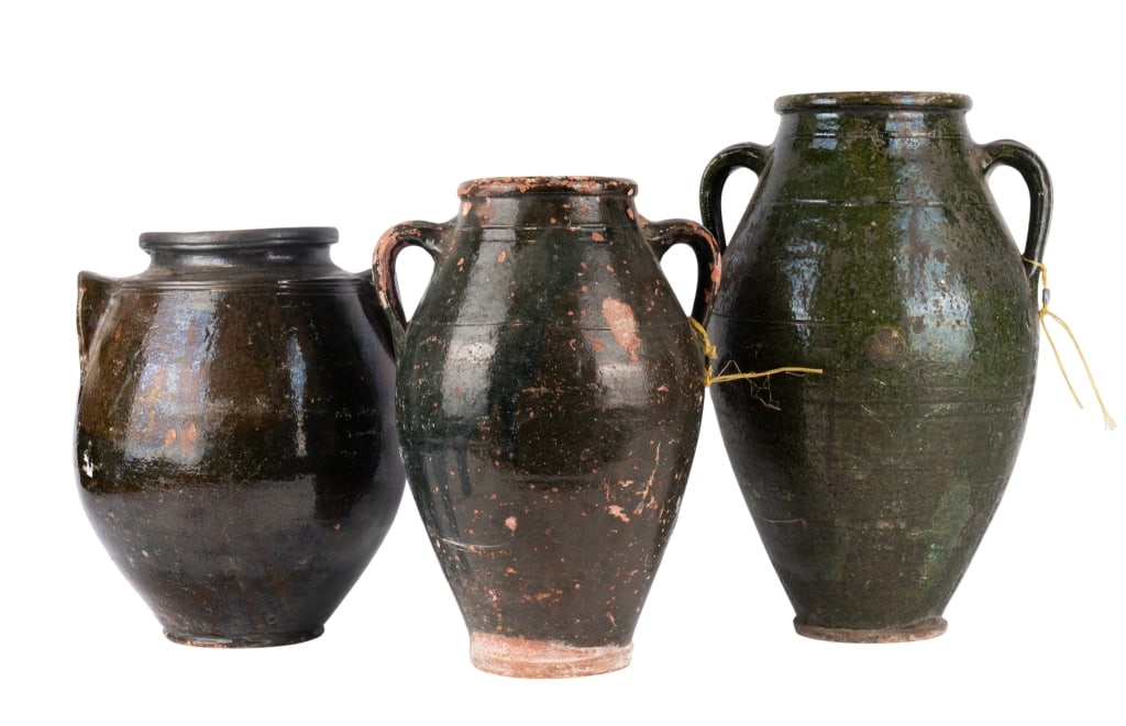 THREE VINTAGE POTTERY VASES: Three vintage pottery vases. Approximate dimensions: h. 17", w. 11", d. 10" Disclaimer: Participating bidders must have a credit card on file with LiveAuctioneers in order for their bidding registrati