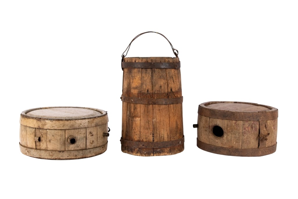 CHINESE PRIMITIVE CANTEEN VESSELS: Chinese primitive canteen vessels with liquid. Approximate dimensions: largest h. 12.5", dia. 9" Disclaimer: Participating bidders must have a credit card on file with LiveAuctioneers in order for the