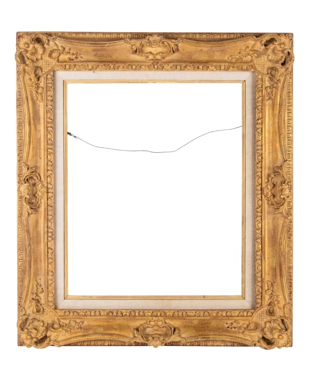 LOUIS XV STYLE GILTWOOD PICTURE FRAME: Louis XV style giltwood picture frame. Approximate dimensions: h. 33", w. 30", d. 3" Disclaimer: Participating bidders must have a credit card on file with LiveAuctioneers in order for their bidding r