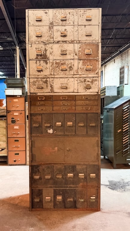 VINTAGE INDUSTRIAL MULTI DRAWER CABINET: Vintage industrial multi drawer cabinet. Approximate dimensions: h. 89.5", w. 33", d. 18" Disclaimer: Participating bidders must have a credit card on file with LiveAuctioneers in order for their bidd