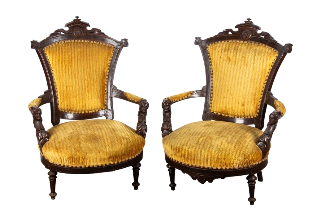 PAIR OF EASTLAKE PARLOR CHAIRS: Pair of Eastlake parlor chairs with yellow velvet upholstery, carved elements, nailhead trim accents. Approximate dimensions: h. 39", w. 26", d. 32" Disclaimer: Participating bidders must have a