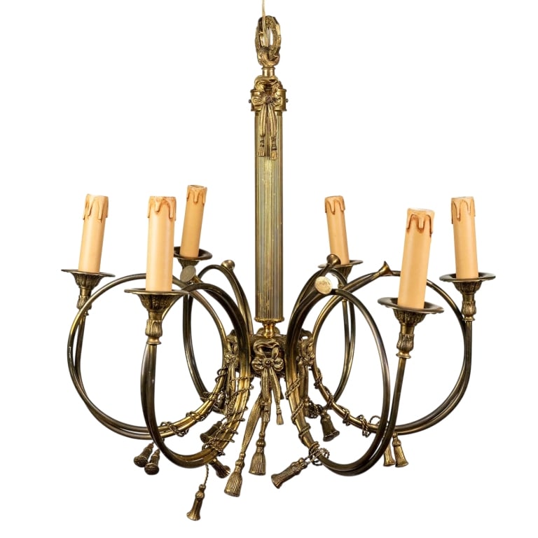 FRENCH BRASS HUNTERS 6-ARM CHANDELIER: French horn form brass chandelier with tassels, surrounded by knotted bows. Approximate dimensions: h. 22.5", w. 20", d. 20" Disclaimer: Participating bidders must have a credit card on file with