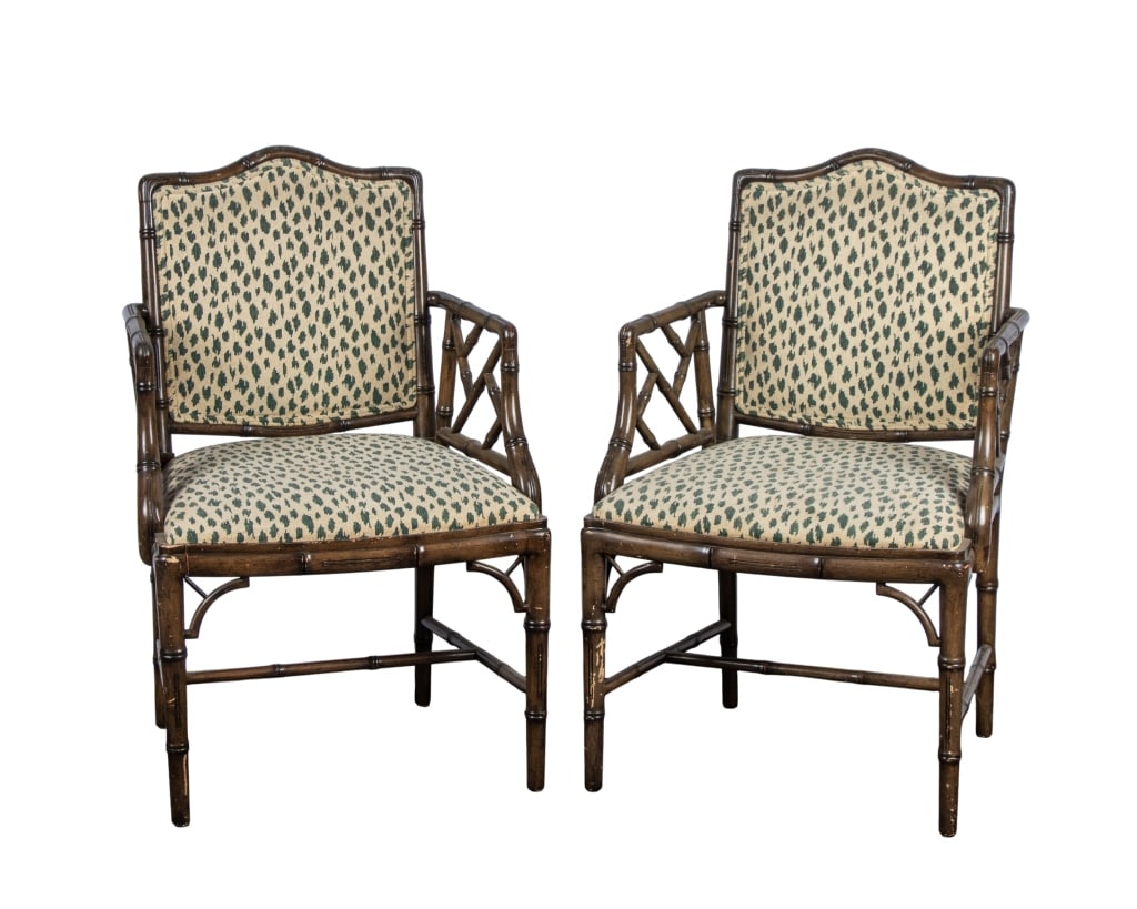 PAIR OF SMITH & WATSON FAUX BAMBOO ARMCHAIRS: Pair of Smith & Watson faux bamboo armchairs with animal print upholstery and stretcher base. Approximate dimensions: h. 37", w. 24", d. 20" Disclaimer: Participating bidders must have a credit card