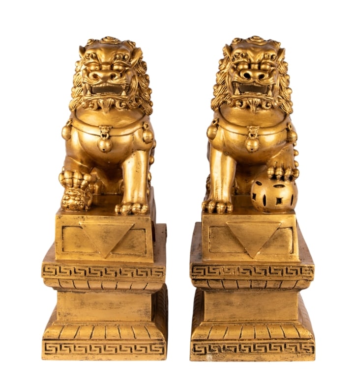 PAIR OF CHINESE GOLD AND BLACK BEIJING LIONS: Pair of Chinese gold and black Beijing lions. Approximate dimensions: h. 25", w. 9.5", d. 14.5" Disclaimer: Participating bidders must have a credit card on file with LiveAuctioneers in order for