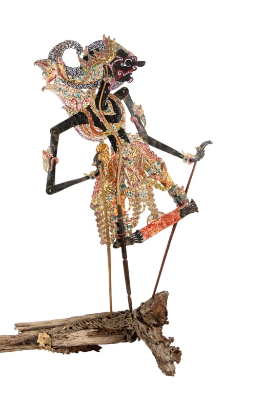 INDONESIAN GATOT KACA YOGYAKARTA SHADOW PUPPET: Indonesian Java Wayang Kulit Gatot Kaca Yogyakarta shadow puppet. Approximate dimensions: h. 30", w. 12" Disclaimer: Participating bidders must have a credit card on file with LiveAuctioneers in