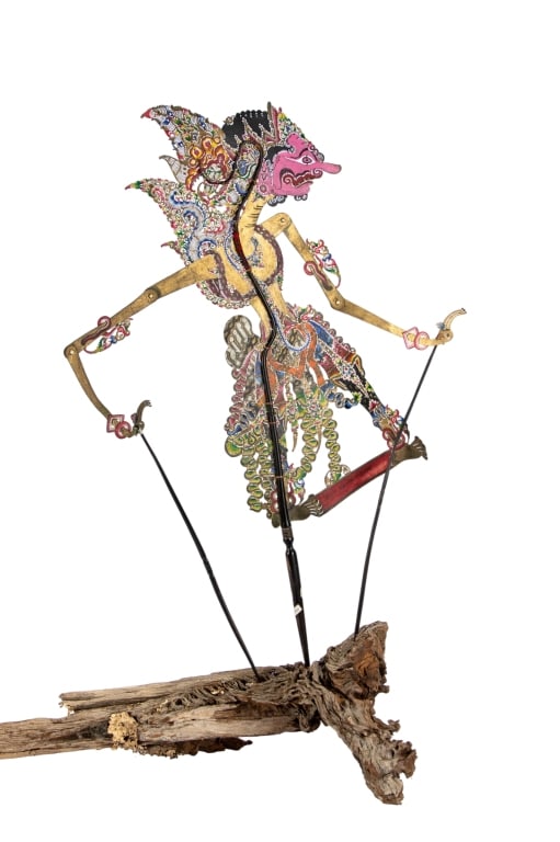INDONESIAN KATROMARMO SURAKARTA SHADOW PUPPET: Early 20th century Indonesian Java Wayang Kulit Katromarmo Surakarta shadow puppet. Approximate dimensions: h. 20", d. 9" Disclaimer: Participating bidders must have a credit card on file with