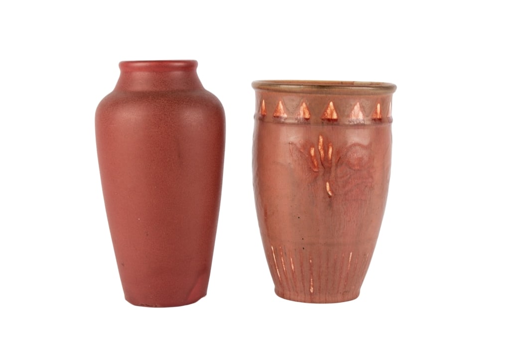 TWO ROOKWOOD ART POTTERY VASES: Two Rookwood art pottery vases. Marked to bottom. Approximate dimensions: h. 10", w. 5", d. 5" Disclaimer: Participating bidders must have a credit card on file with LiveAuctioneers in order for