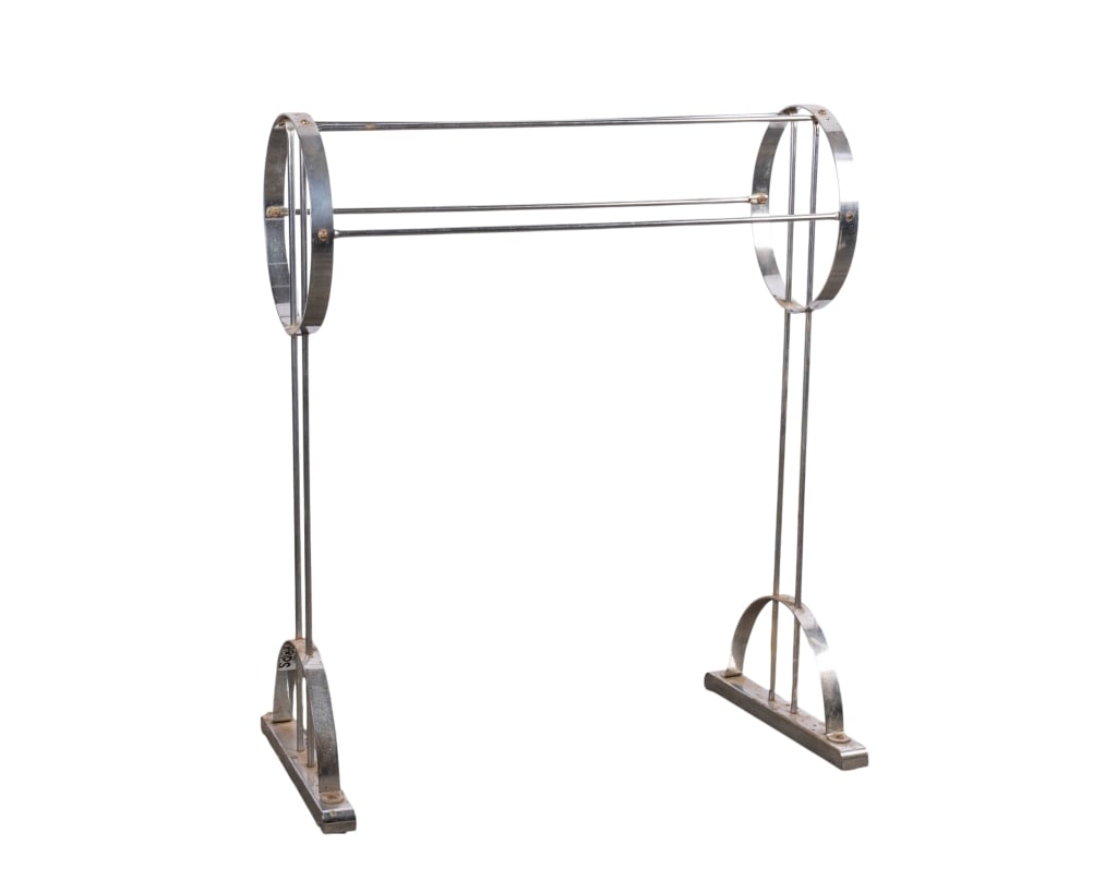 MCM CHROME MAGAZINE STAND: MCM chrome magazine stand. Approximate dimensions: h. 32", w. 26.25", d. 13" Disclaimer: Participating bidders must have a credit card on file with LiveAuctioneers in order for their bidding