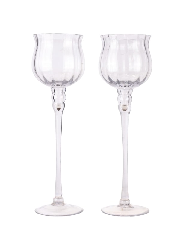 LARGE LONG STEM HAND BLOWN GLASS CANDLE HOLDERS: Large form long stem hand blown glass candle holders. Approximate dimensions: h. 20.25", dia. 6" Disclaimer: Participating bidders must have a credit card on file with LiveAuctioneers in order for the