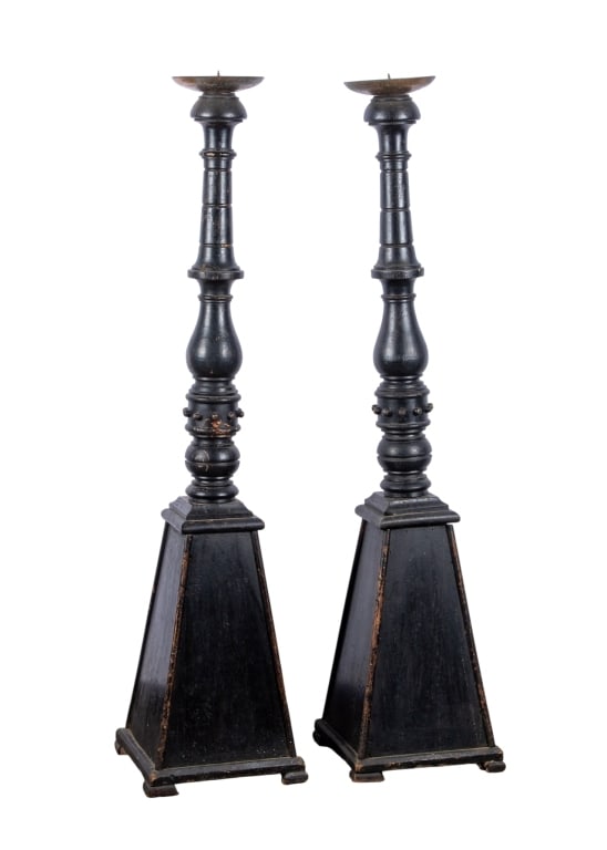 PAIR OF WOOD FLOOR CANDLE HOLDERS: Pair of wood floor candle holders with brass tops. Approximate dimensions: h. 45", w. 10.5", d. 10.5" Disclaimer: Participating bidders must have a credit card on file with LiveAuctioneers in order