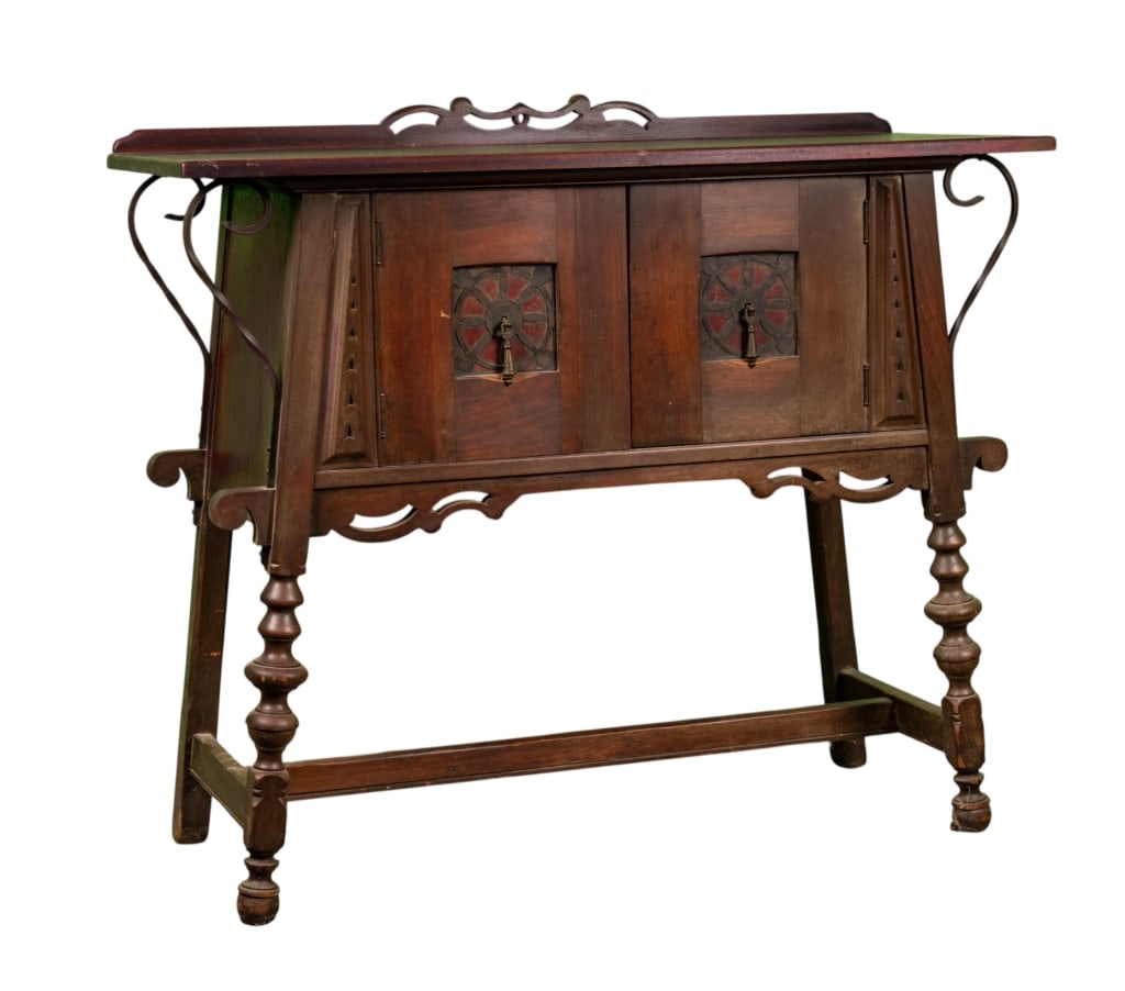 SPANISH COLONIAL STYLE SERVER: Spanish Colonial Style server with stretcher base, carved panels, and teardrop pulls. Approximate dimensions: h. 37", w. 42", d. 17" Disclaimer: Participating bidders must have a credit card on file