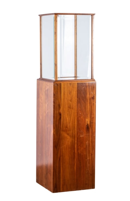 SPANISH CEDAR BEVELED GLASS MUSEUM DISPLAY CASE: Vintage Spanish cedar beveled glass museum display case. Approximate dimensions: h. 69", w. 18", d. 18" Disclaimer: Participating bidders must have a credit card on file with LiveAuctioneers in order 