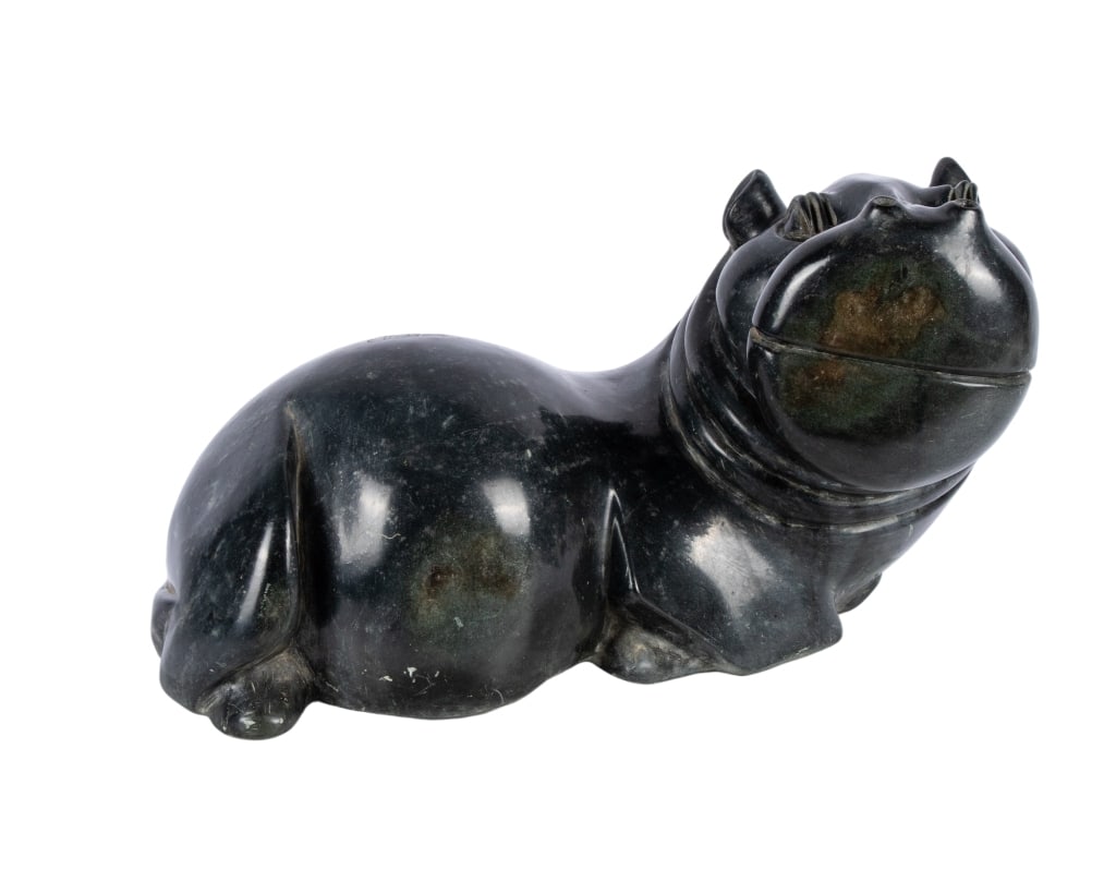 SERPENTINE STONE HIPPOPOTAMUS SHONA SCULPTURE: Zimbabwe, 20th century. Hippopotamus Shona sculpture carved from Serpentine stone. Approximate dimensions: h. 12", w. 18", d. 13" Disclaimer: Participating bidders must have a credit card on file