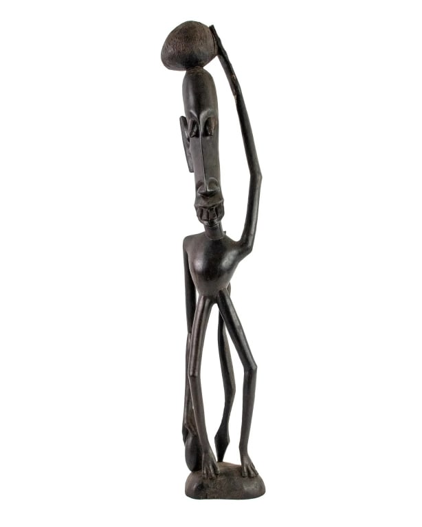 AFRICAN MAKONDE CARVED IRONWOOD SHETANI SCULPTURE: African Tanzania Makonde 'Shetani' (evil spirit or devil) carved wood figural sculpture depicting a man with extremely exaggerated features and extra limbs. Approximate dimensions: h. 23", w. 5", d.