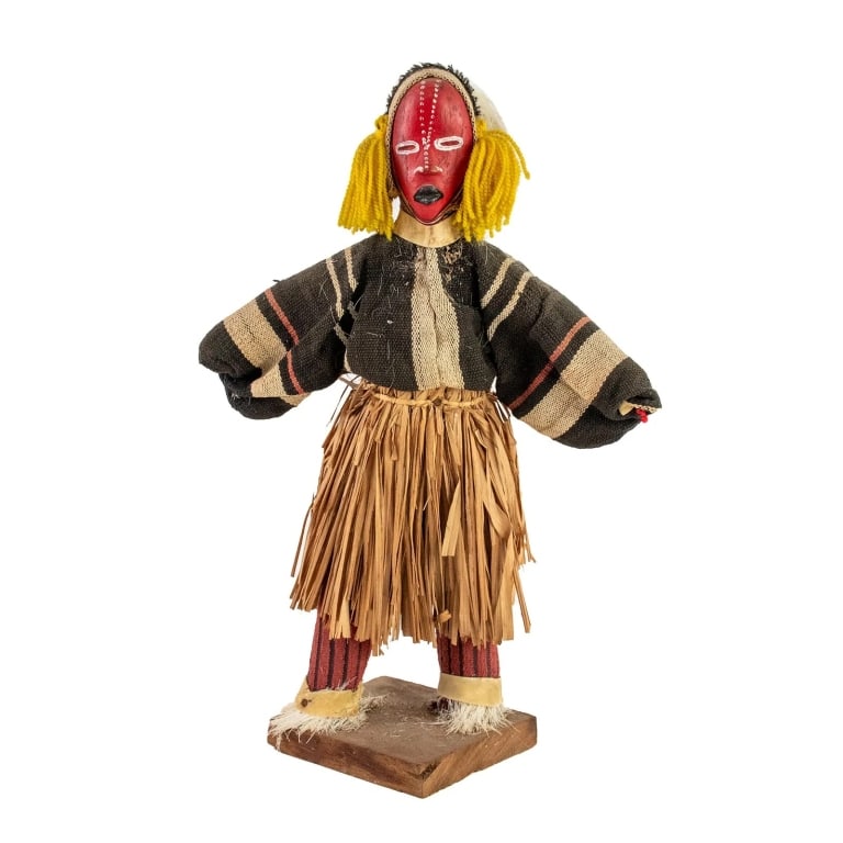 AFRICAN IVORY COAST DEANGLE DAN DANCER DOLL: African Ivory Coast or Cote D'ivoire Deangle hand-crafted doll depicting a dancer in a ritual masquerade costume and mask featuring hand-painted details. Approximate dimensions: h. 14", w. 9.5", d.