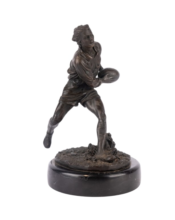 FIGURAL BRONZE SCULPTURE BY LOBO: Figural bronze sculpture of man with football. Signed "Lobo". Approximate dimensions: h. 9", w. 6.5", d. 5.5" Disclaimer: Participating bidders must have a credit card on file with LiveAuctioneers in