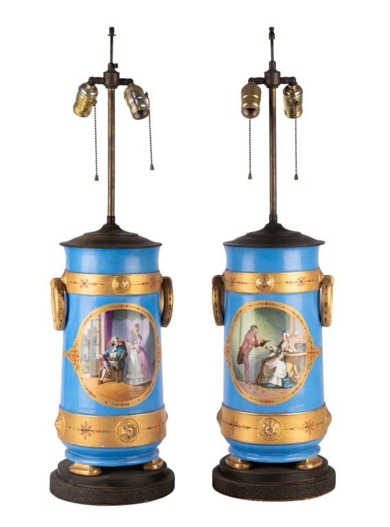 PAIR OF FRENCH LIMOGES STYLE PORCELAIN TABLE LAMPS: Pair of French Limoges style hand-painted porcelain table lamps. Approximate dimensions: h. 32", dia. 9" Disclaimer: Participating bidders must have a credit card on file with LiveAuctioneers in