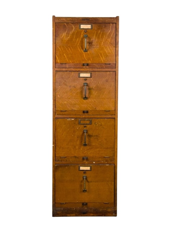 VINTAGE TIGER OAK 4 DRAWER FILE CABINET: Vintage tiger oak 4 drawer file cabinet. Approximate dimensions: h. 54", w. 18", d. 25" Disclaimer: Participating bidders must have a credit card on file with LiveAuctioneers in order for their biddin