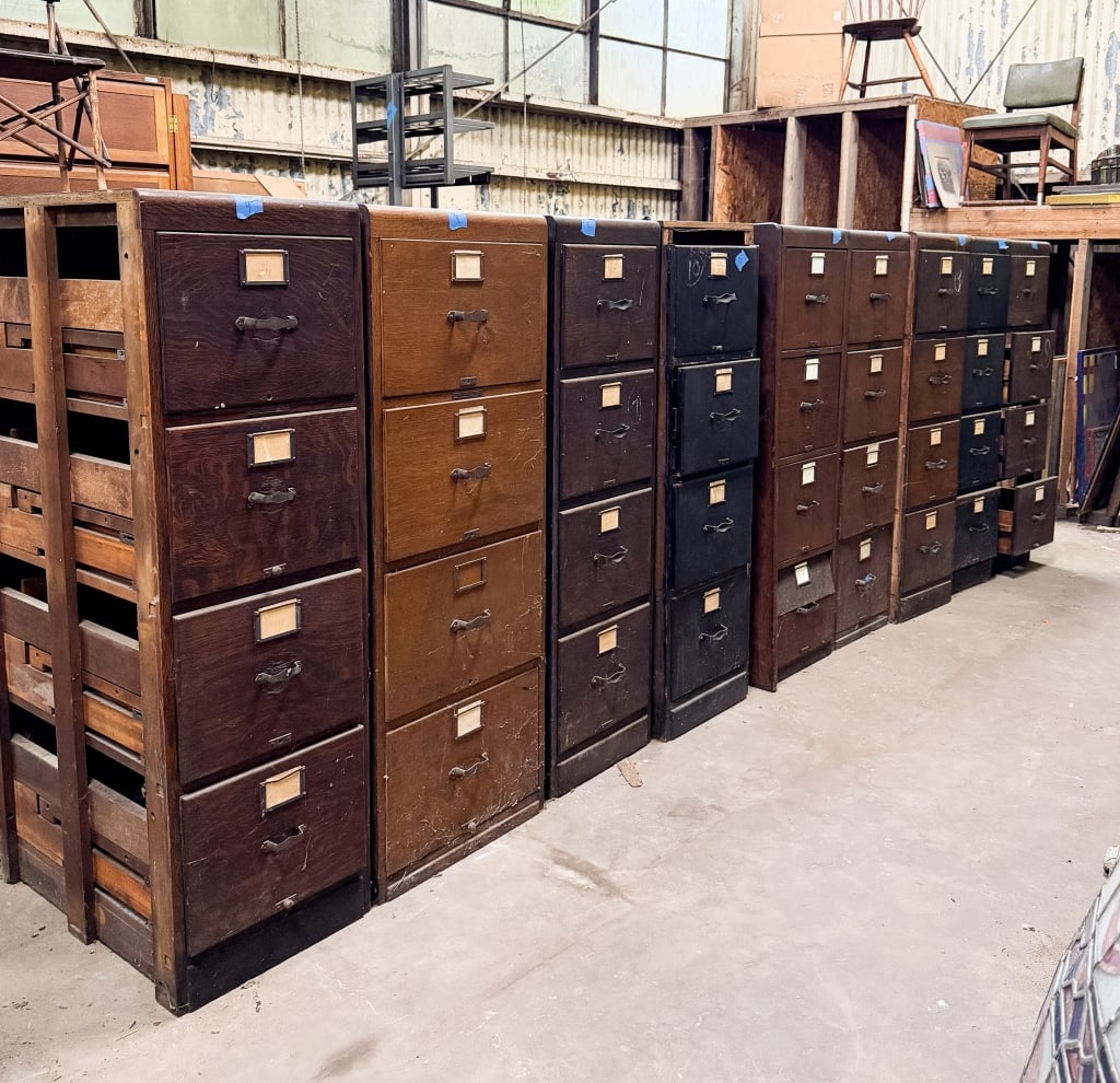 9 VINTAGE 4 DRAWER FILING CABINETS: 9 vintage 4 drawer filing cabinets. Approximate dimensions: h. 51.5", w. 15.25", d. 26.5" Disclaimer: Participating bidders must have a credit card on file with LiveAuctioneers in order for their bidd