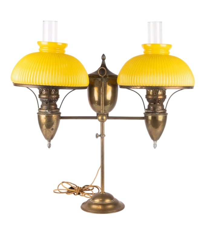 BRADLEY & HUBBARD CONVERTED LIBRARY ACORN SHADE LAMP: Bradley & Hubbard converted student/library acorn shade double light lamp. Approximate dimensions: h. 26", w. 26", d. 11" Disclaimer: Participating bidders must have a credit card on file with