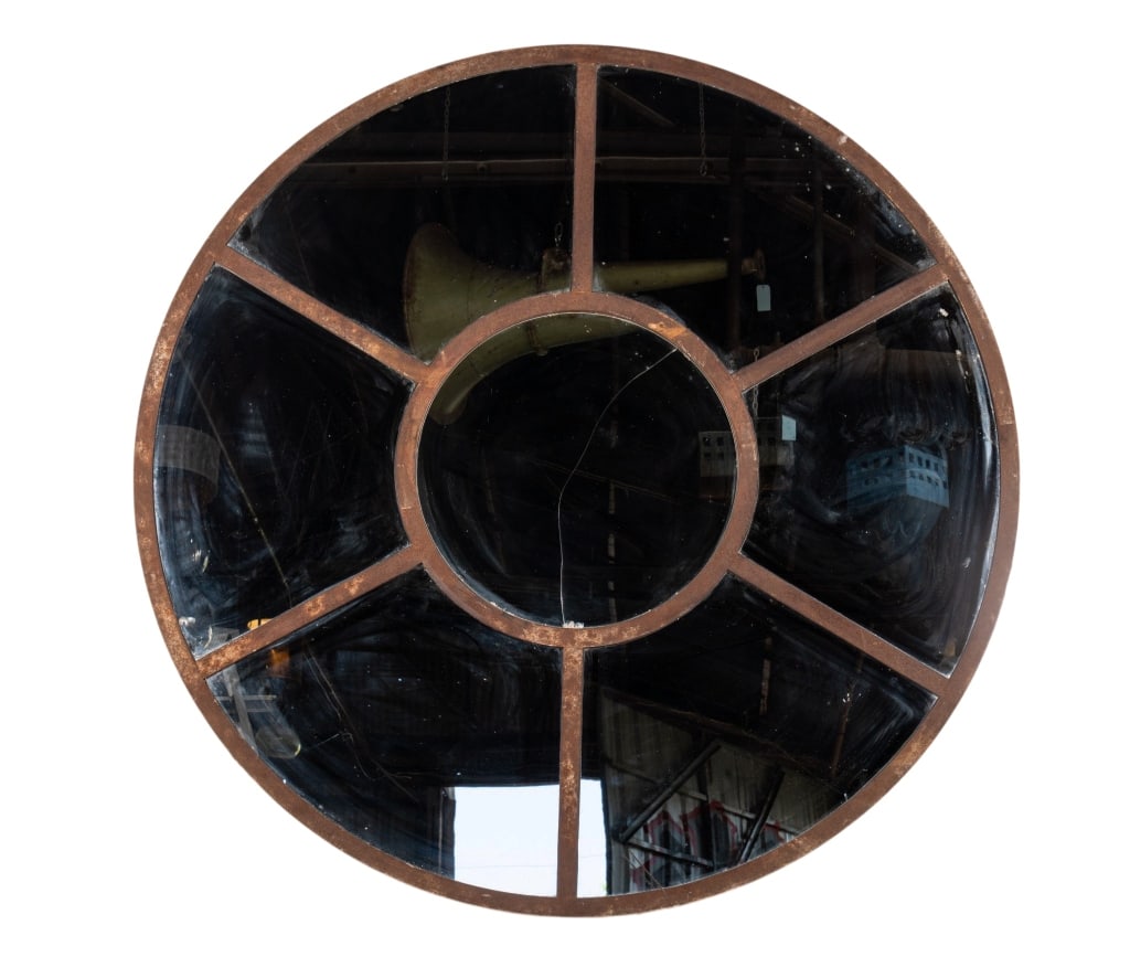 MONUMENTAL FRENCH METAL ROUND MIRROR: Monumental French metal round mirror. Approximate dimensions: dia. 74", d. 1" Disclaimer: Participating bidders must have a credit card on file with LiveAuctioneers in order for their bidding