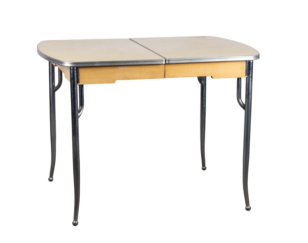 MID-CENTURY FORMICA & CHROME DINETTE TABLE: Mid-century Formica and chrome dinette table. Approximate dimensions: h. 30.25", w. 42.25", d. 30" Disclaimer: Participating bidders must have a credit card on file with LiveAuctioneers in order for