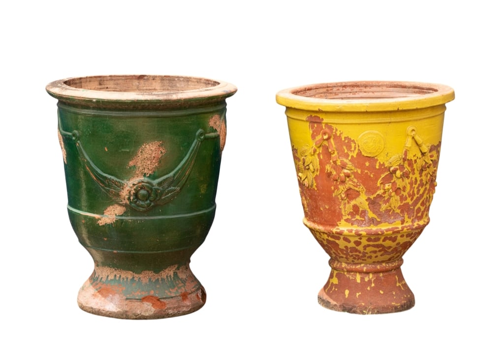 TWO VINTAGE FRENCH TERRACOTTA PLANTERS: Two vintage French Terracotta planters with garland motif. Both marked "Pour de Jardin La Provence". Approximate dimensions: h. 32.5", dia. 28" Disclaimer: Participating bidders must have a credit