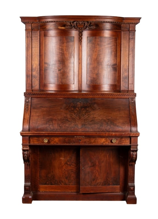 AMERICAN EASTLAKE STYLE SECRETARY DESK: American Eastlake style secretary desk with carved supports and carved appliques. Approximate dimensions: h. 69", w. 45.5", d. 27" Disclaimer: Participating bidders must have a credit card on file