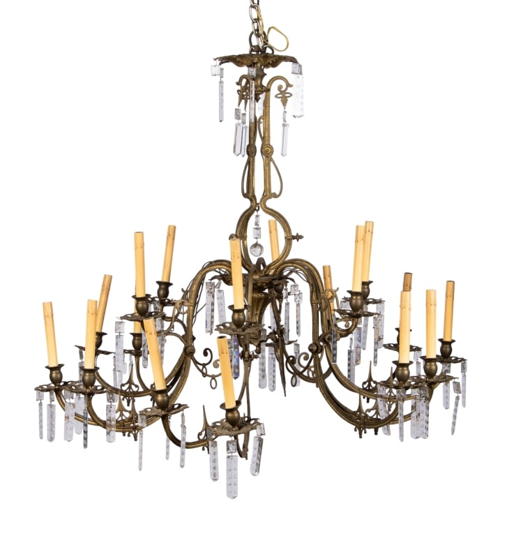 18-LIGHT BRASS & CRYSTAL CHANDELIER: 18-light brass and crystal chandelier. Approximate dimensions: h. 34", dia. 43" Disclaimer: Participating bidders must have a credit card on file with LiveAuctioneers in order for their bidding