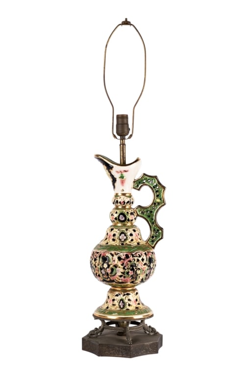 VINTAGE CAPODIMONTE STYLE PITCHER TABLE LAMP: Vintage Capodimonte style pitcher table lamp with dolphin foot base, floral elements, and gilt accents. Approximate dimensions: h. 34", w. 8", d. 8" Disclaimer: Participating bidders must have a