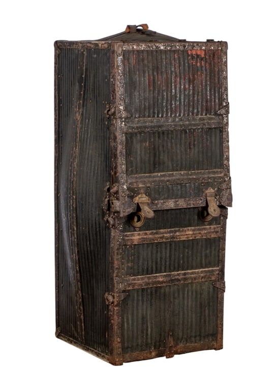 INNOVATION TRUNK CO. STEAMER TRUNK: Innovation Trunk Co. steamer trunk with leather handle. Approximate dimensions: h. 53.5", w. 22", d. 21" Disclaimer: Participating bidders must have a credit card on file with LiveAuctioneers in