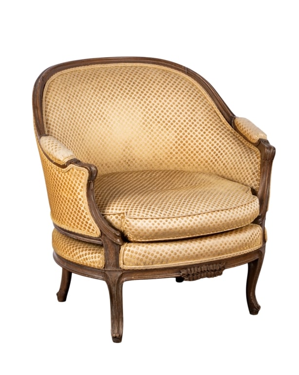 FRENCH LOUIS XV STYLE ARMCHAIR: French Louis XV style armchair with carved details throughout. Approximate dimensions: h. 35", w. 34", d. 29" Disclaimer: Participating bidders must have a credit card on file with LiveAuctioneers in 