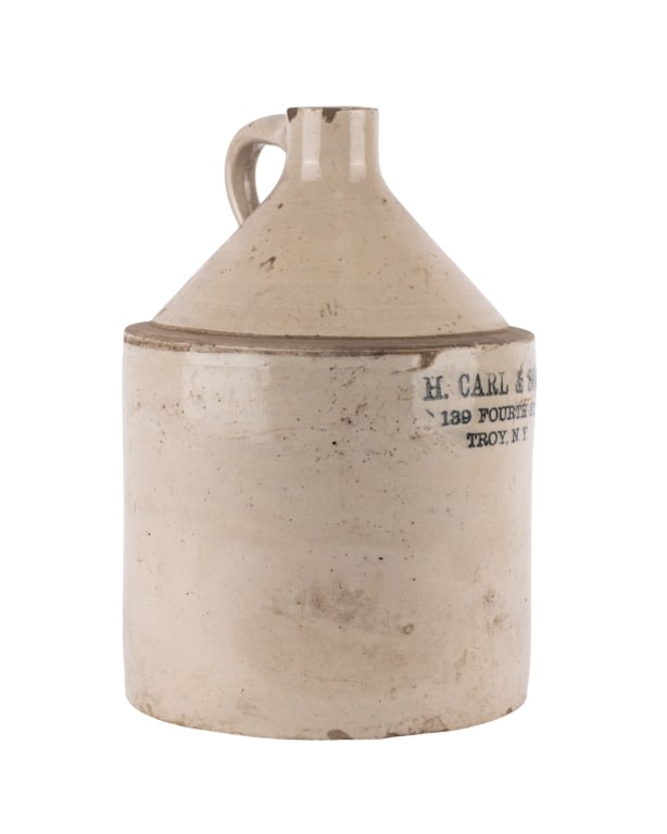 H. CARL & SON STONEWARE MILK JUG: H. Carl & Son stoneware milk jug. Marked to the side. Approximate dimensions: h. 13.5", dia. 9" Disclaimer: Participating bidders must have a credit card on file with LiveAuctioneers in order for