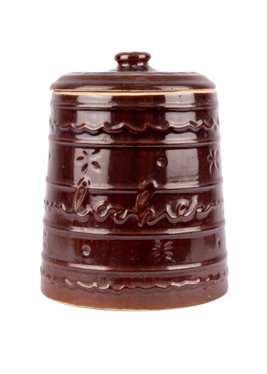 MARCREST STONEWARE COOKIE JAR: Marcrest stoneware cookie jar. Marked to the bottom. Approximate dimensions: h. 9.25", dia. 7.5" Disclaimer: Participating bidders must have a credit card on file with LiveAuctioneers in order for