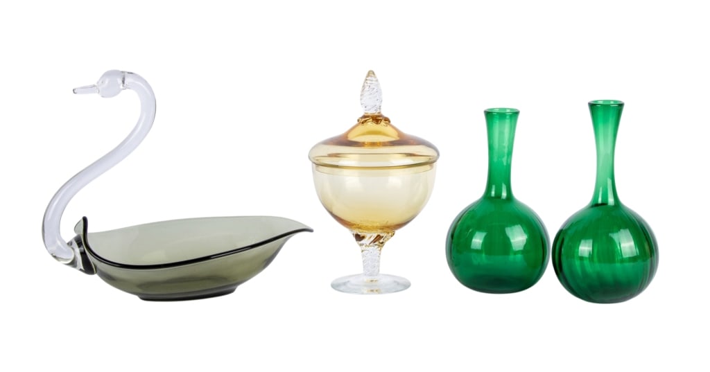 COLLECTION OF 4 MID-CENTURY GLASS ITEMS: Collection of 4 Mid-Century glass items including 2 emerald glass vases, swan dish and lidded candy dish. Approximate dimensions: swan dish h. 10", w. 11", d. 6.5" Disclaimer: Participating bidders