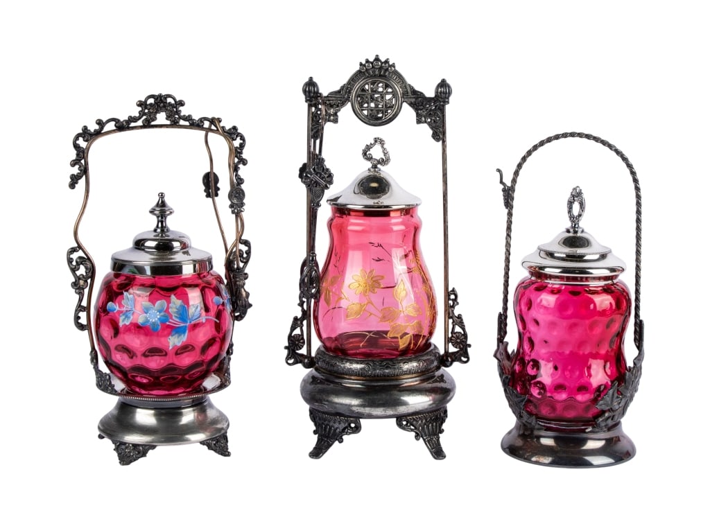 THREE VICTORIAN ART GLASS PICKLE CASTORS: Three Victorian art glass pickle castors. Approximate dimensions: h. 12", dia. 5" Disclaimer: Participating bidders must have a credit card on file with LiveAuctioneers in order for their bidding