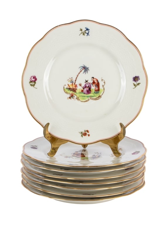 SET OF 8 LIMOGES STYLE PORCELAIN PLATES: Set of 8 Limoges style porcelain plates. Marked to the underside. Approximate dimensions: dia. 9.5" Disclaimer: Participating bidders must have a credit card on file with LiveAuctioneers in order for