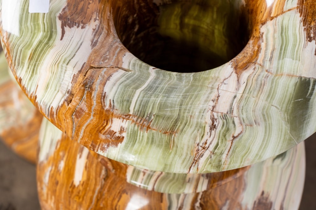 PAIR OF POLISHED ONYX FLOOR VASES - 12