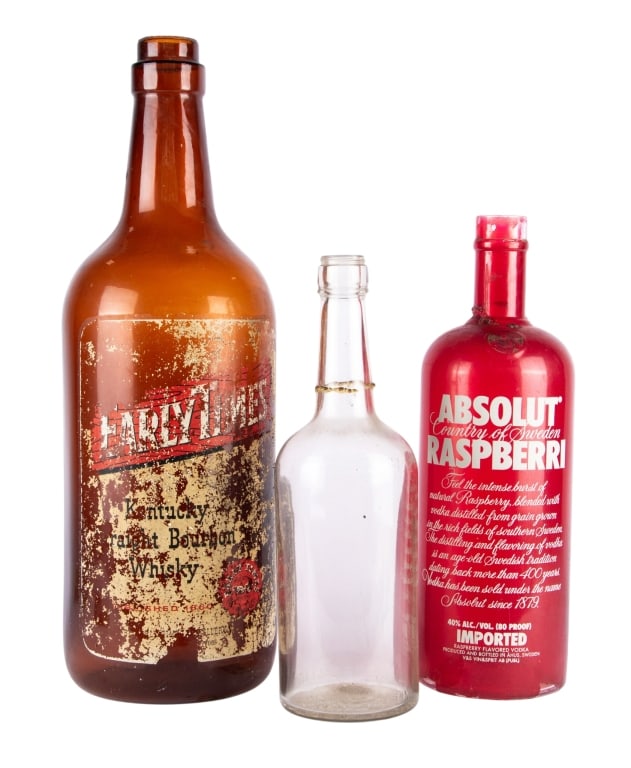 THREE LARGE VINTAGE LIQUOR BOTTLES: Three large vintage liquor bottles. Approximate dimensions: h. 28", w. 8" Disclaimer: Participating bidders must have a credit card on file with LiveAuctioneers in order for their bidding