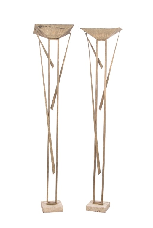PAIR OF MCM TORCH?RE FLOOR LAMPS: Pair of MCM torchere floor lamps. Approximate dimensions: h. 71.5", w. 15", d. 8" Disclaimer: Participating bidders must have a credit card on file with LiveAuctioneers in order for their bidding