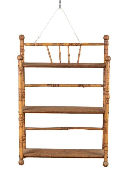 FAUX BAMBOO WALL SHELF: Faux bamboo wall shelf. Approximate dimensions: h. 26", w. 19.5", d. 6.25" Disclaimer: Participating bidders must have a credit card on file with LiveAuctioneers in order for their bidding
