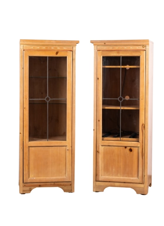 TWO MODERN SHOWCASE CABINETS: Two modern showcase cabinets with glass shelves in one and wood shelves in the other. Approximate dimensions: h. 59.75", w. 22", d. 18.25" Disclaimer: Participating bidders must have a credit card on