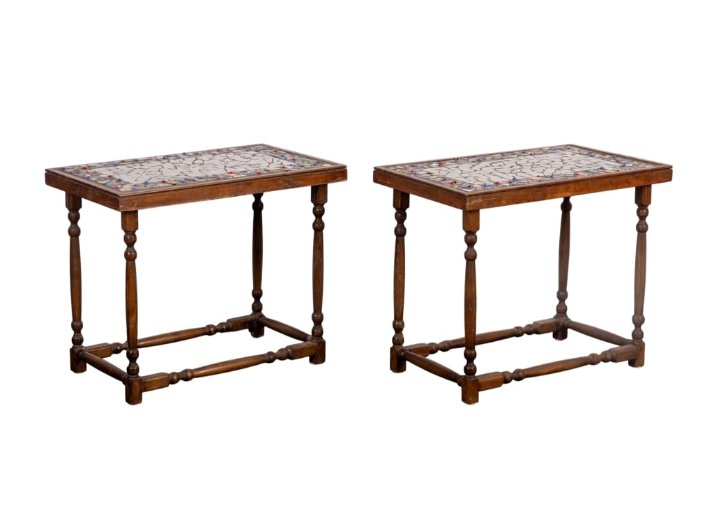 PAIR OF VINTAGE MOSAIC SIDE TABLES: Pair of mosaic side tables with stretcher bases, white and colored tesserae, and jeweled accents. Approximate dimensions: h. 21", w. 26", d. 16" Disclaimer: Participating bidders must have a credit