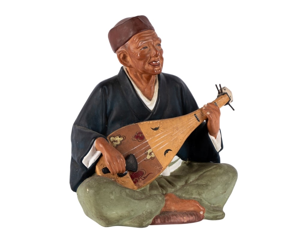 JAPANESE HAKATA CERAMIC FIGURINE: Japanese Hakata ceramic figurine. Approximate dimensions: h. 8", w. 7", d. 4" Disclaimer: Participating bidders must have a credit card on file with LiveAuctioneers in order for their bidding