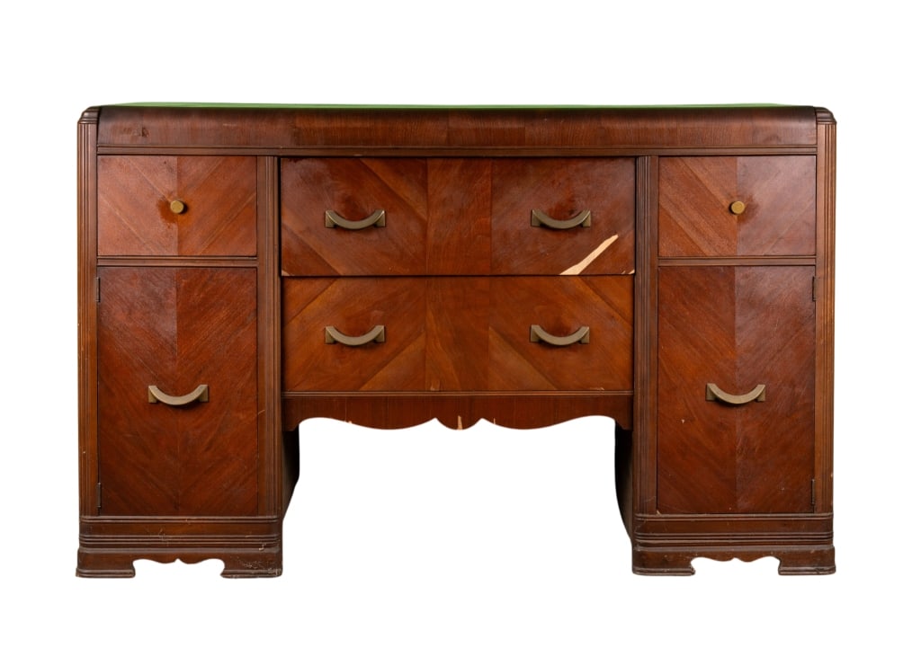ART DECO 6-DRAWER DRESSER: Art Deco 6-drawer dresser with ribbon-shaped brass pulls. Approximate dimensions: h. 37.5", w. 60", d. 20.5" Disclaimer: Participating bidders must have a credit card on file with LiveAuctioneers in