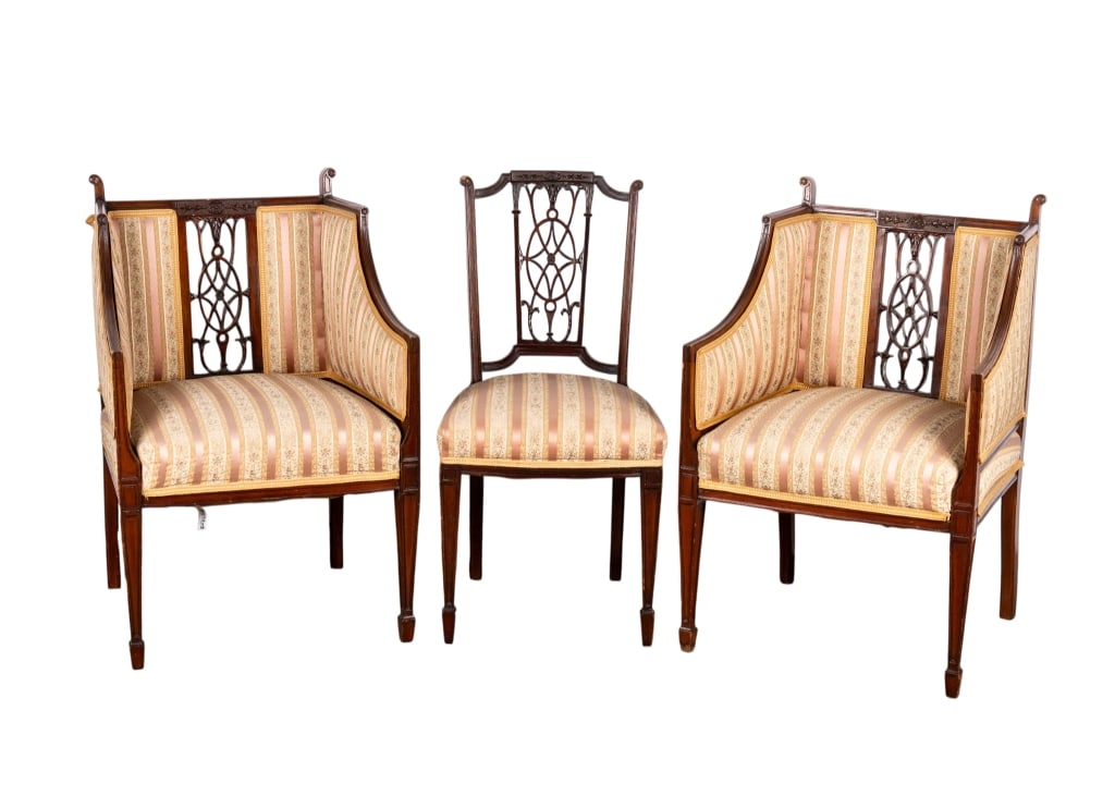 TWO PAIRS OF EDWARDIAN STYLE CARVED CHAIRS: Two pairs of Edwardian Style carved chairs with elaborate carving to the back and floral upholstery. Approximate dimensions: h. 35", w. 23", d. 21" Disclaimer: Participating bidders must have a