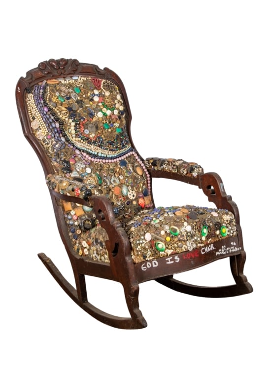 MARY PROCTOR 'GOD IS LOVE' ROCKING CHAIR: Mary Proctor. "God is love" - 1996, mixed media rocking chair. Titled "God is love", signed, dated '96. Approximate dimensions: h. 39", w. 22.5", d. 36" Disclaimer: Participating bidders must have a c