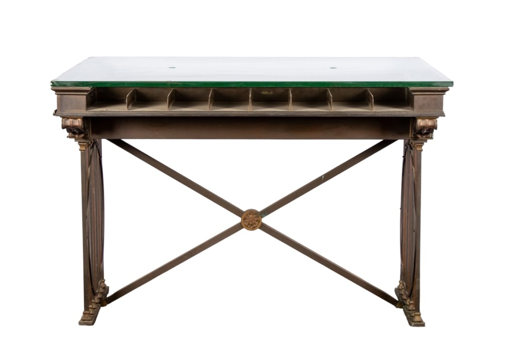 VINTAGE METAL & GLASS BANK COUNTER: Vintage metal and glass bank counter. Approximate dimensions: h. 37.25", w. 54", d. 36" Disclaimer: Participating bidders must have a credit card on file with LiveAuctioneers in order for their